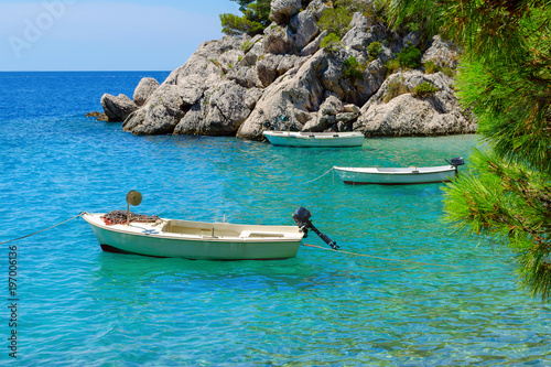 Brela, Croatia with adriatic sea and boats in summer. Dalmatia, Makarska Riviera