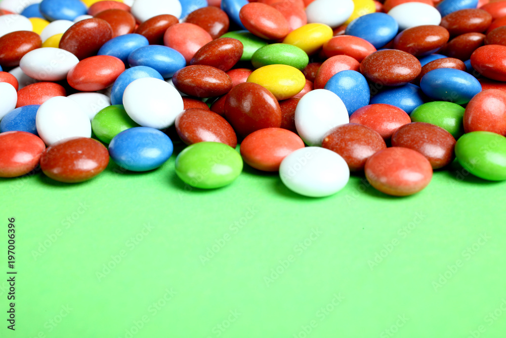 Chocolate pellet in colored glaze Chocolate pellet in colored glaze