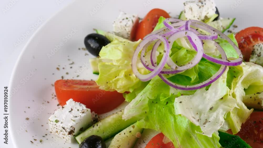 Greek salad for Healthy eating, fresh vegetables with feta cheese, served in Restaurant Greek salad for Healthy eating, fresh vegetables with feta cheese, served in Restaurant