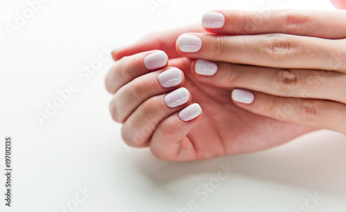  female hands, white manicure