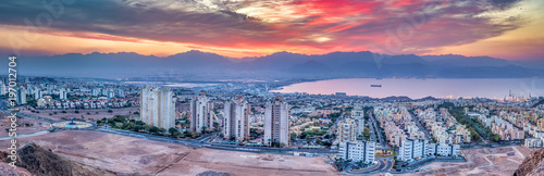 Panoramic aerial scenic view on Eilat (Israel) and Aqaba (Jordan) cities in the early morning 