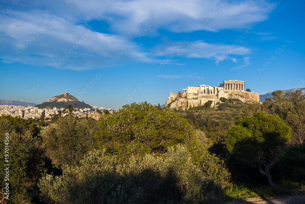 The Parthenon Temple at the Acropolis of Athens during colorful sunset, Greece