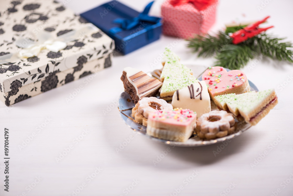 Traditional celebration festive homemade decorated sweets on wooden background Traditional celebration festive homemade decorated sweets on wooden background