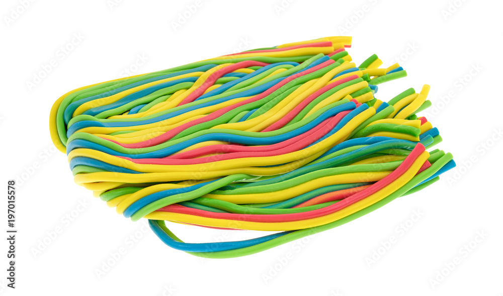 A large wad of string candy isolated on a white background.