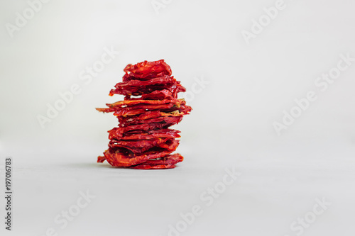 Stack of dried tomatoes. Sun dried  tomatoes lying on each other photo