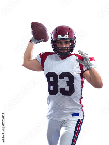 american football player throwing ball
