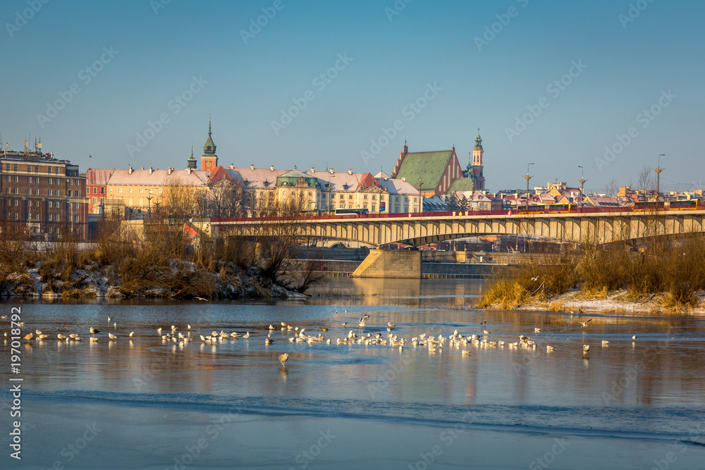 Slasko-Dabrowski bridge over the Vistula river and panorama old town in Warsaw, Poland