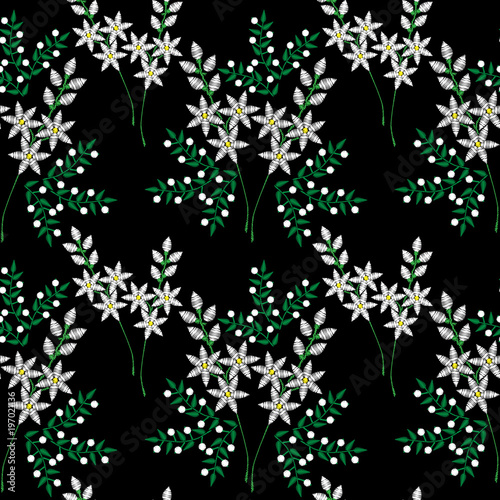Seamless pattern with embroidery stitches imitation fashion pattern with folk flower
