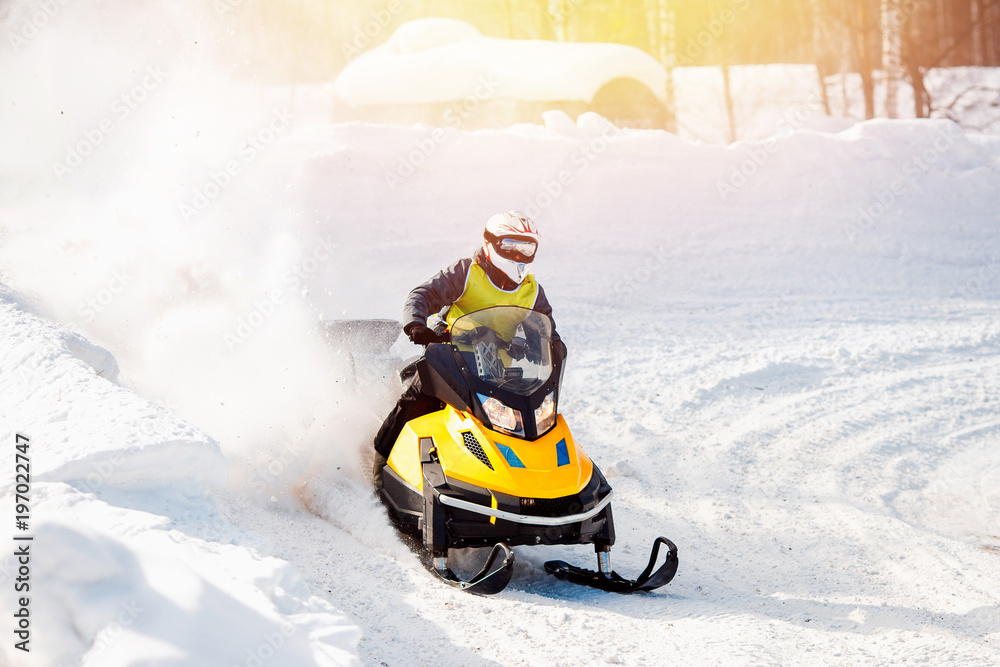 Snowmobile. Snowmobile races in the snow. Concept winter sports, racers.