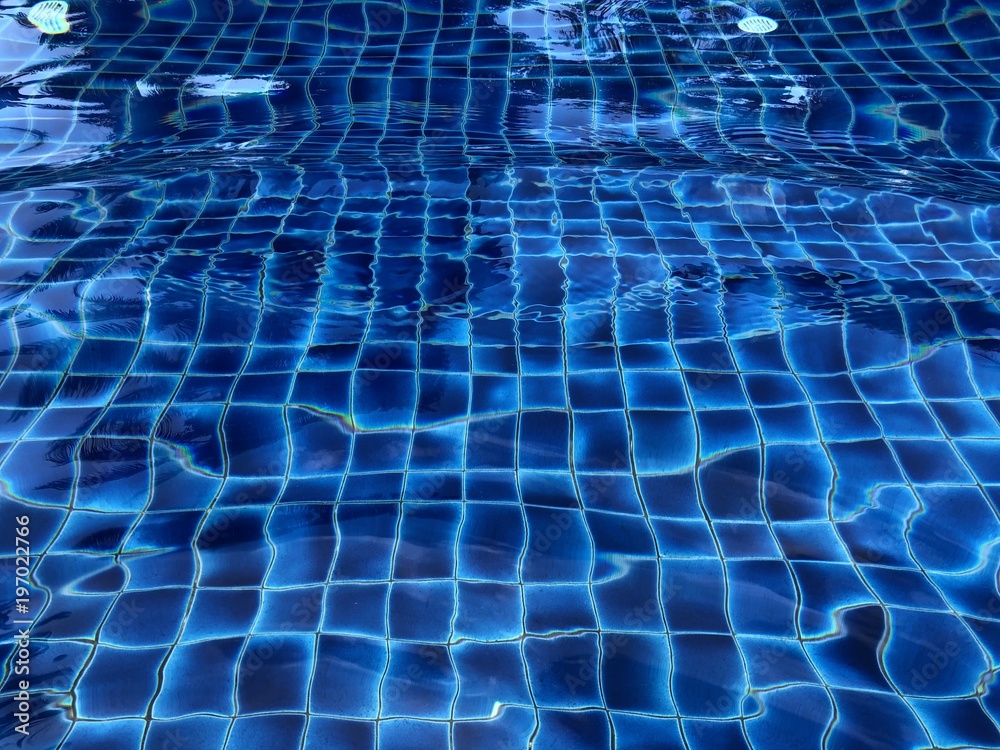 Wave in blue pool Wave in blue pool