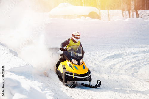 Snowmobile. Snowmobile races in the snow. Concept winter sports, racers.