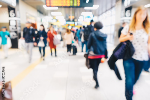Blurred people in train station movement rush hour