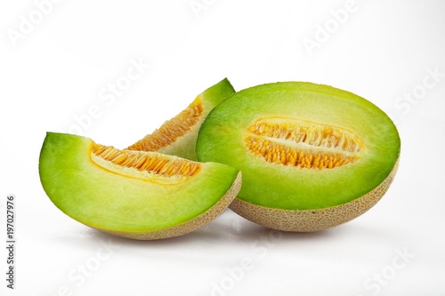 Half and Slices of Canteloupe Melon