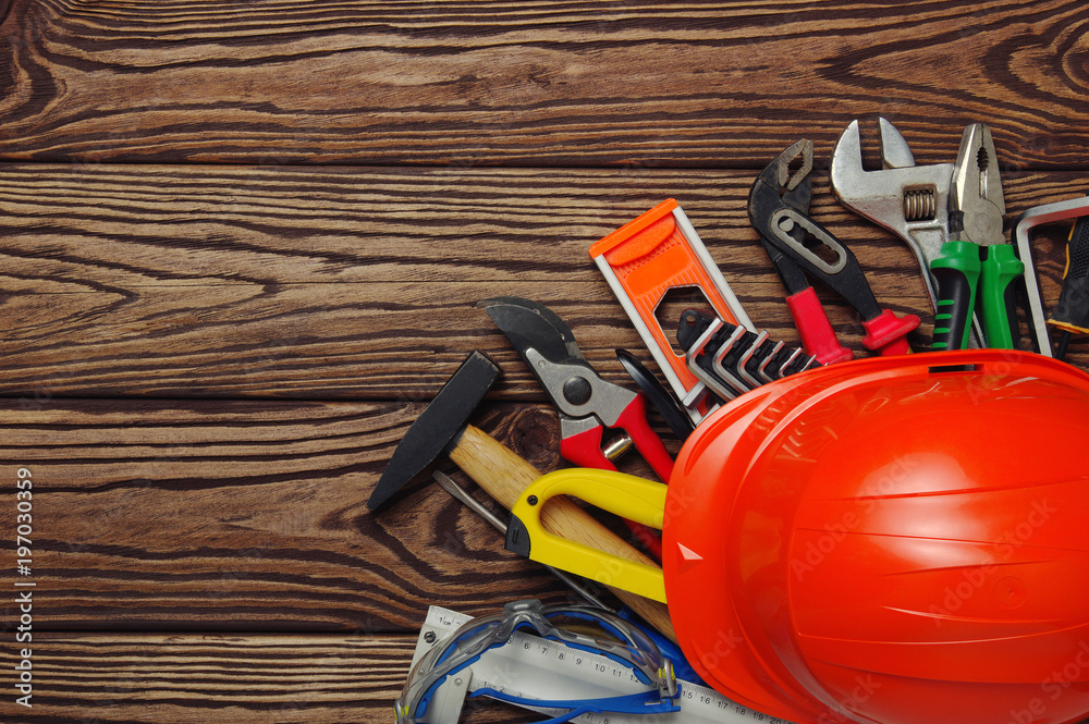 Fototapeta premium Tools on wood background