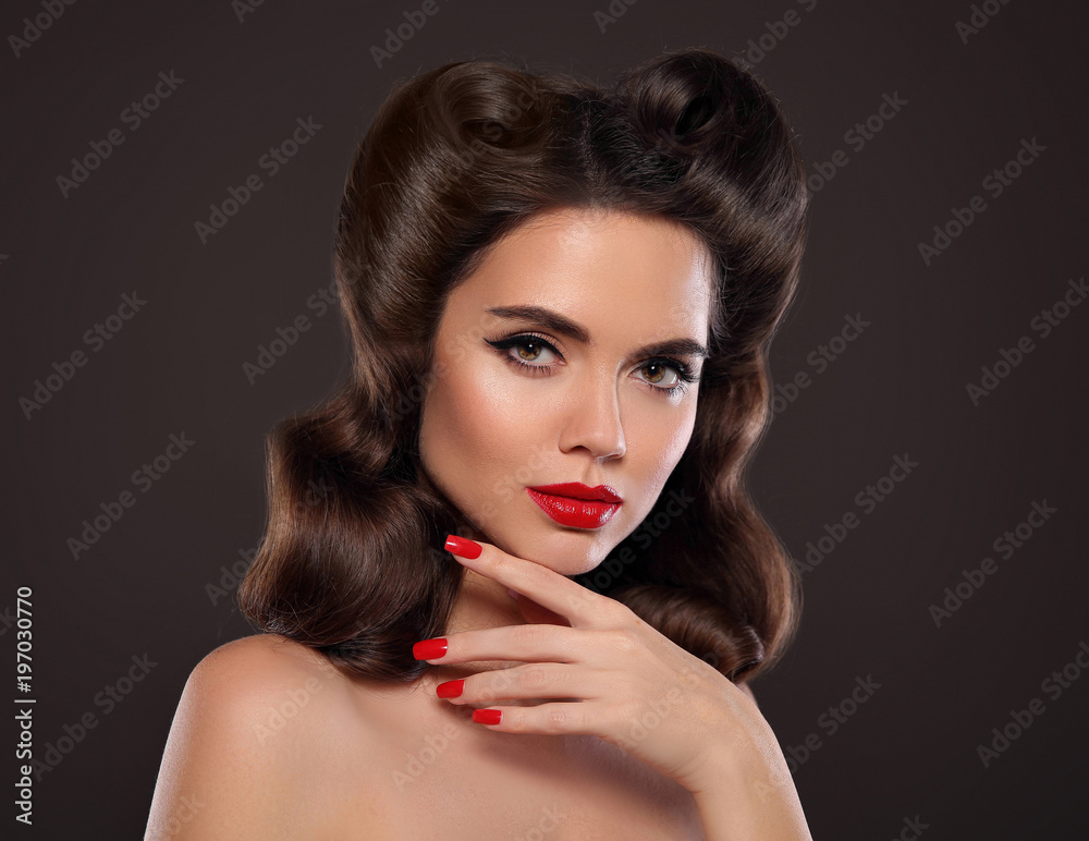 Red lips makeup and manicure nails. Retro Woman portrait