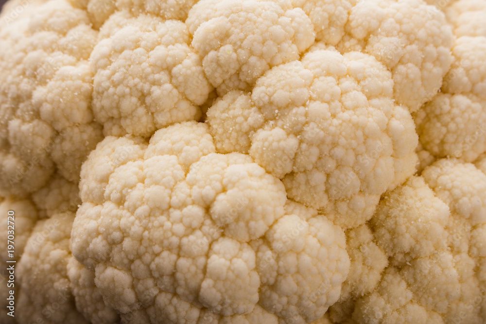 fresh cauliflower on a rustic wooden background fresh cauliflower on a rustic wooden background