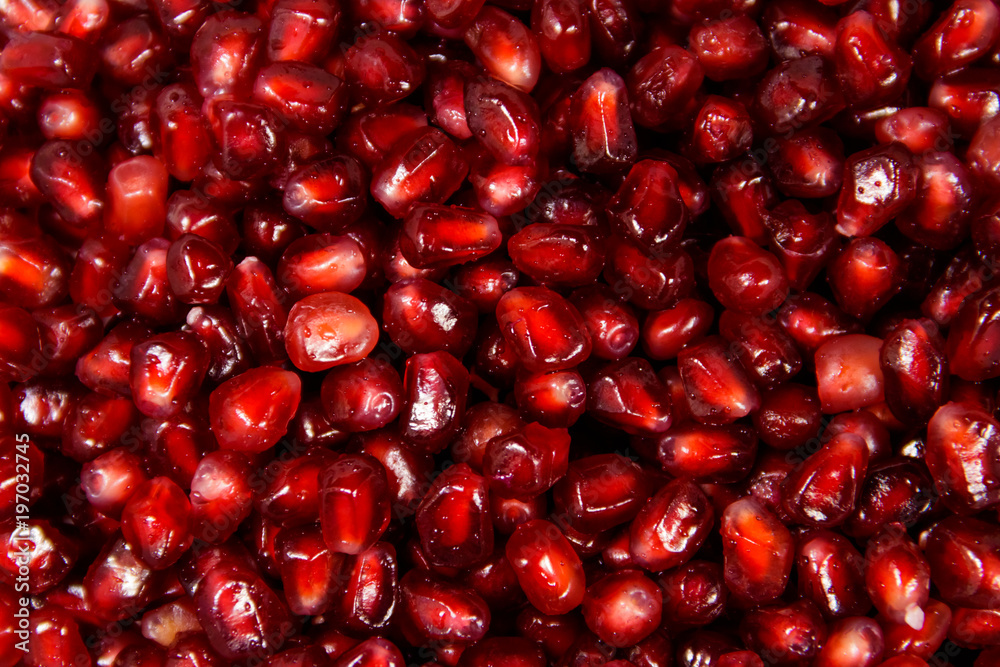 Food background of the fresh ripe pomegranate seeds Food background of the fresh ripe pomegranate seeds