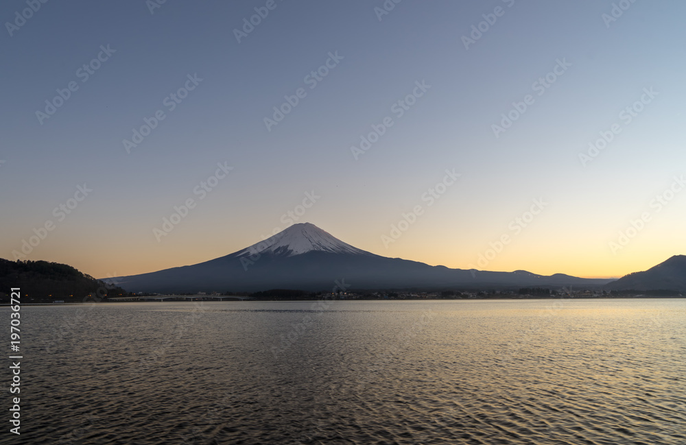 scenic of sunsut light behind mt.fuji on kawaguchiko lake