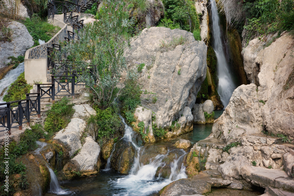 Big beautiful waterfall, near well-groomed tourist paths
