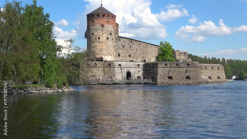 Sunny June day at the fortress of Olavinlinna. Savonlinna, Finland Sunny June day at the fortress of Olavinlinna. Savonlinna, Finland