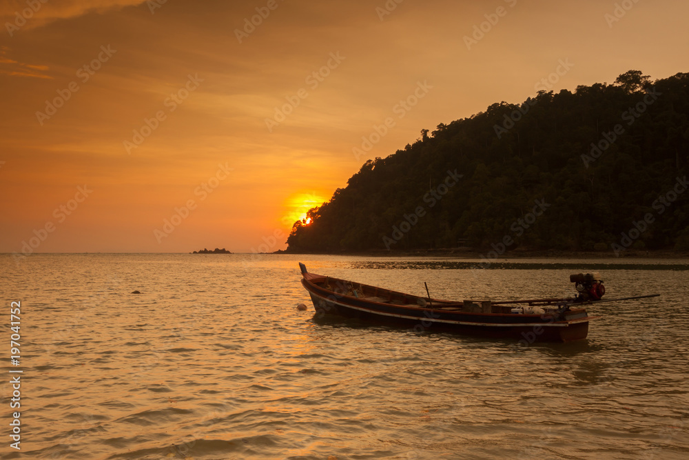 Fishing boat in sea at Twilight time.