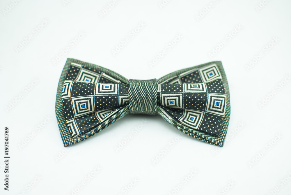 Stylish and well-designed pale green bow tie on a white background; isolated