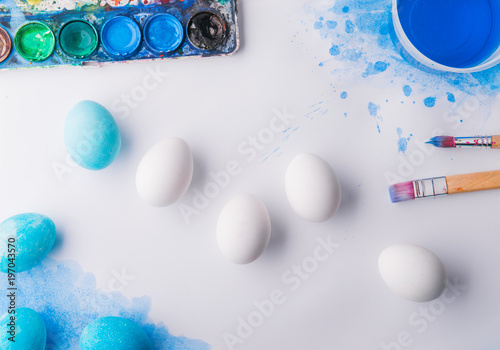 Eggs flat lay on a white background. Easter and spring composition.