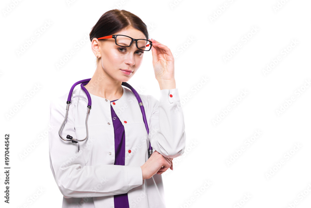 Young beautiful female doctor with raised glasses on white background Young beautiful female doctor with raised glasses on white background