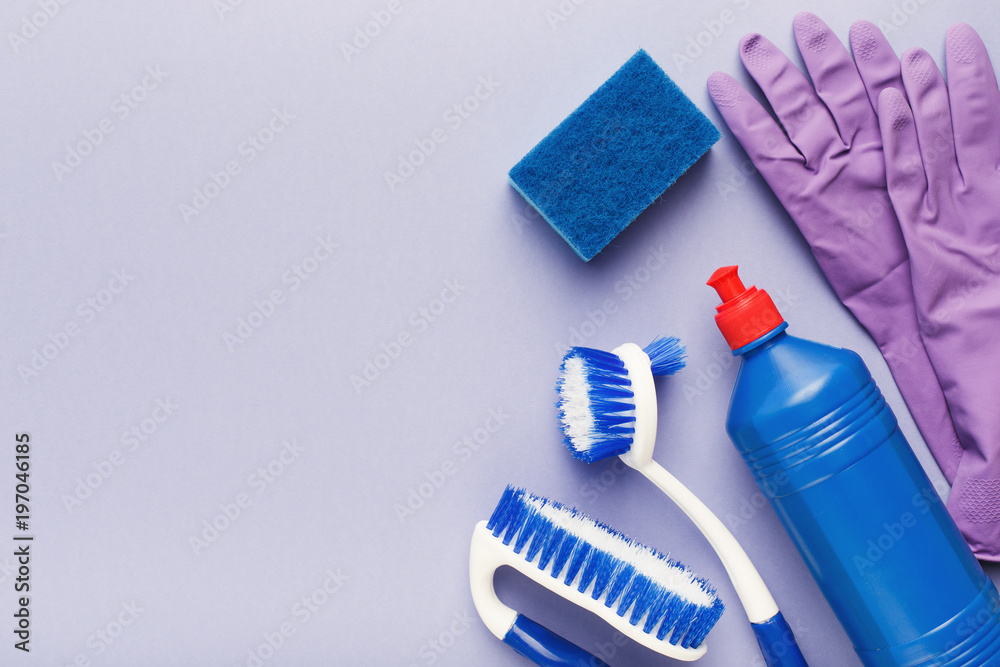 Various cleaning supplies, housekeeping background Stock Photo by