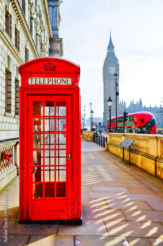 Red telephone box and Big Ben in London.