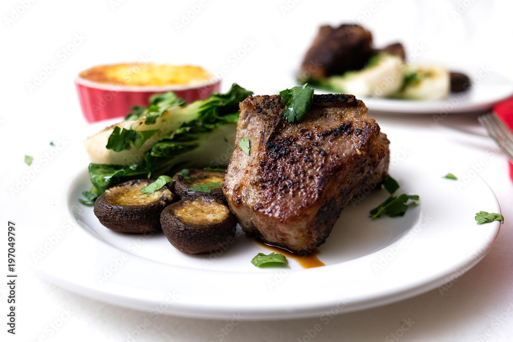 Delicious meat served on plate Delicious meat served on plate