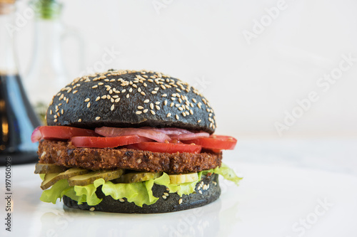 Black burger with beef meat...