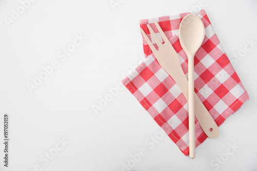 Kitchen utensils on tablecloth