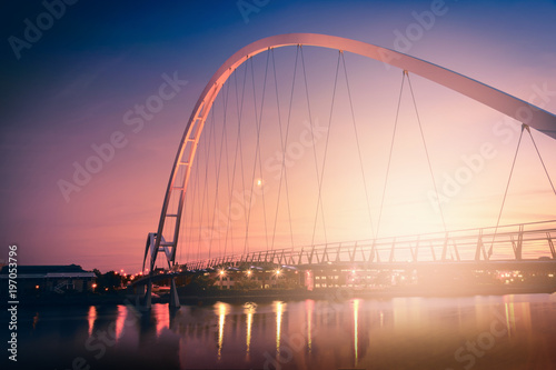 Infinity Bridge on dramatic sky at sunset in Stockton-on-Tees  UK.