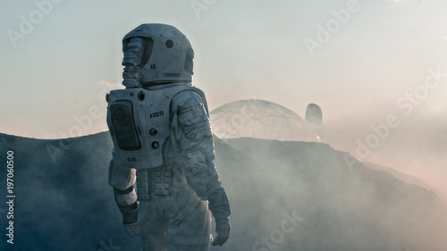 Shot of the Astronaut on Red Planet Watching Toward His Base/Research Station. Near Future First Manned Mission To Mars, Technological Advance Brings Space Exploration, Colonization.