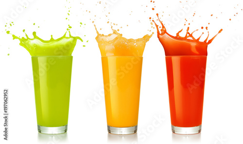 green, yellow and red juice glasses splashing isolated on white
