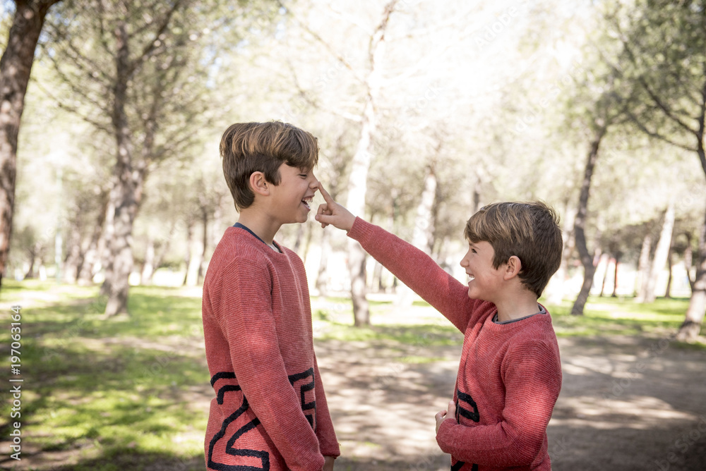 brothers together in the park brothers together in the park