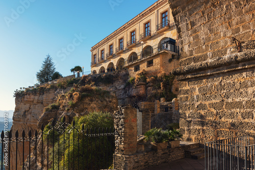 View under Arch of Puente Nuevo bridge in Ronda, one of the famous white villages in Andalusia, Spain