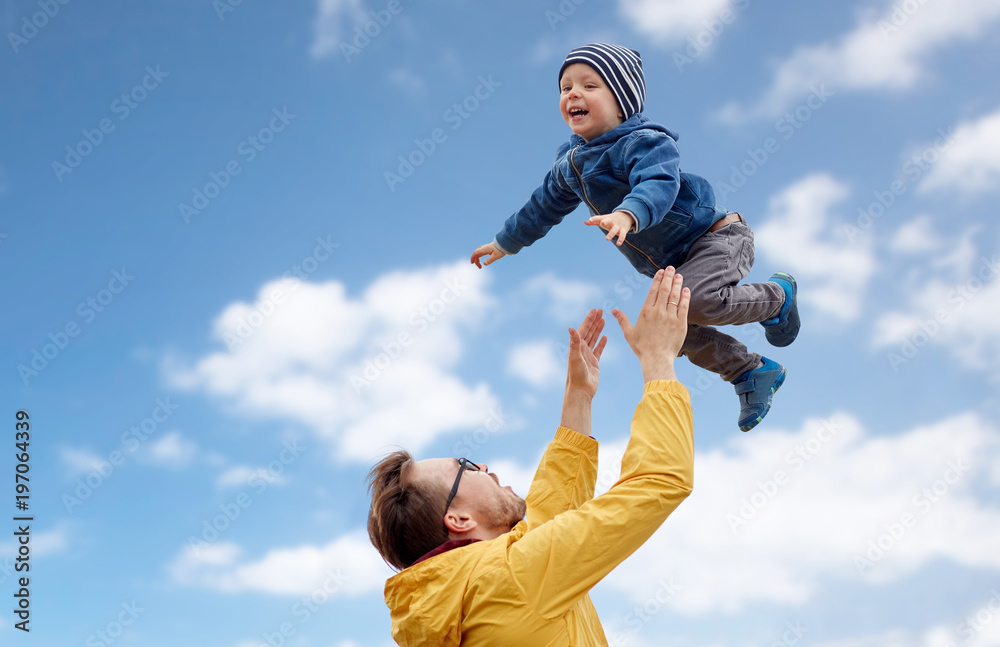 father with son playing and having fun outdoors father with son playing and having fun outdoors