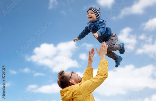 father with son playing and having fun outdoors