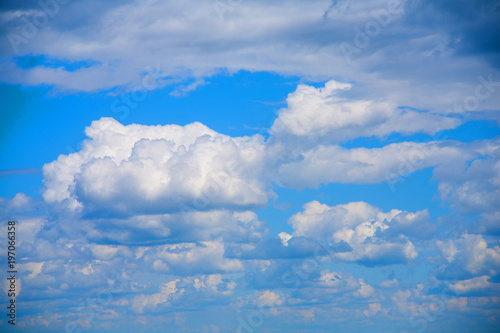 Sky clouds on a background of bright blue sky