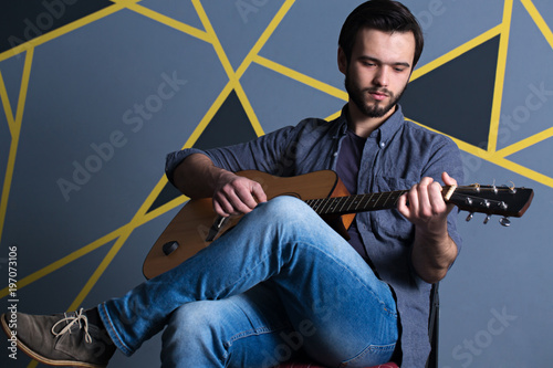 young man with guitar