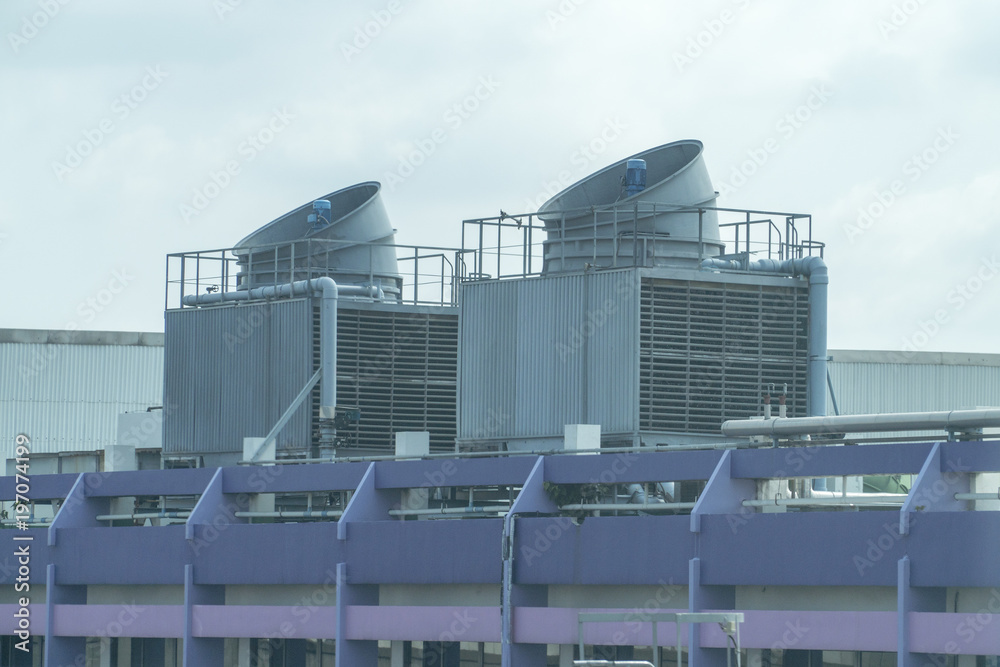 Obraz premium Cooling towers on daylight on the purple floor
