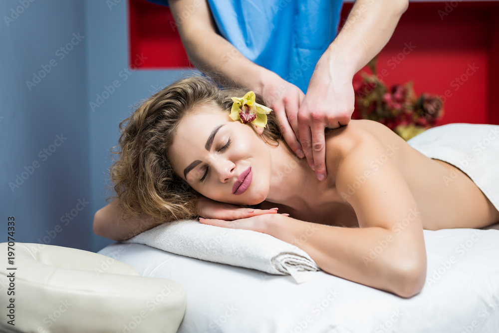 Obraz premium Young, beautiful and healthy woman in spa salon.