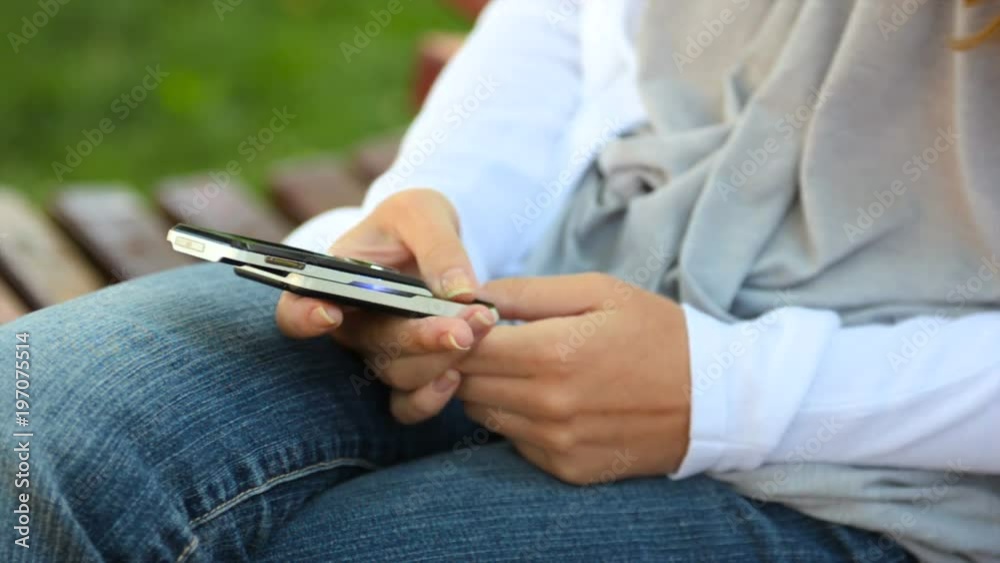 Woman sending digital message