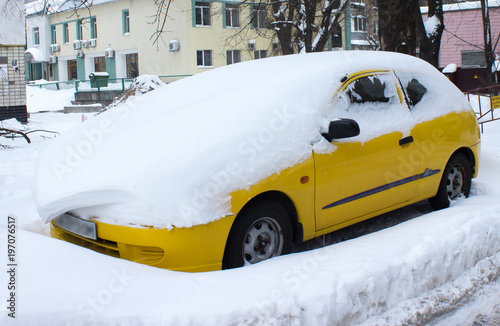 Car covered with snow