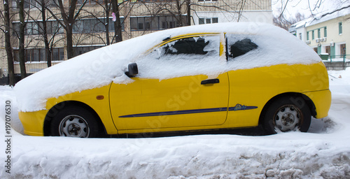 Car covered with snow