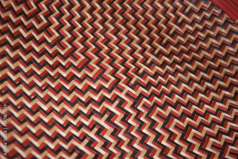 Closeup of seamless red, white and black craft pattern. Closeup of Latin American ethnic vintage handicraft. Closeup of seamless red, white and black craft pattern. Closeup of Latin American ethnic vintage handicraft.