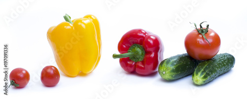 Red pepper with yellow pepper and tomatoes on a white background.