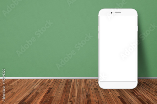 Big white phone standing up to green wall on wooden floor in empty room. Isolated screen for advertising. Mockup